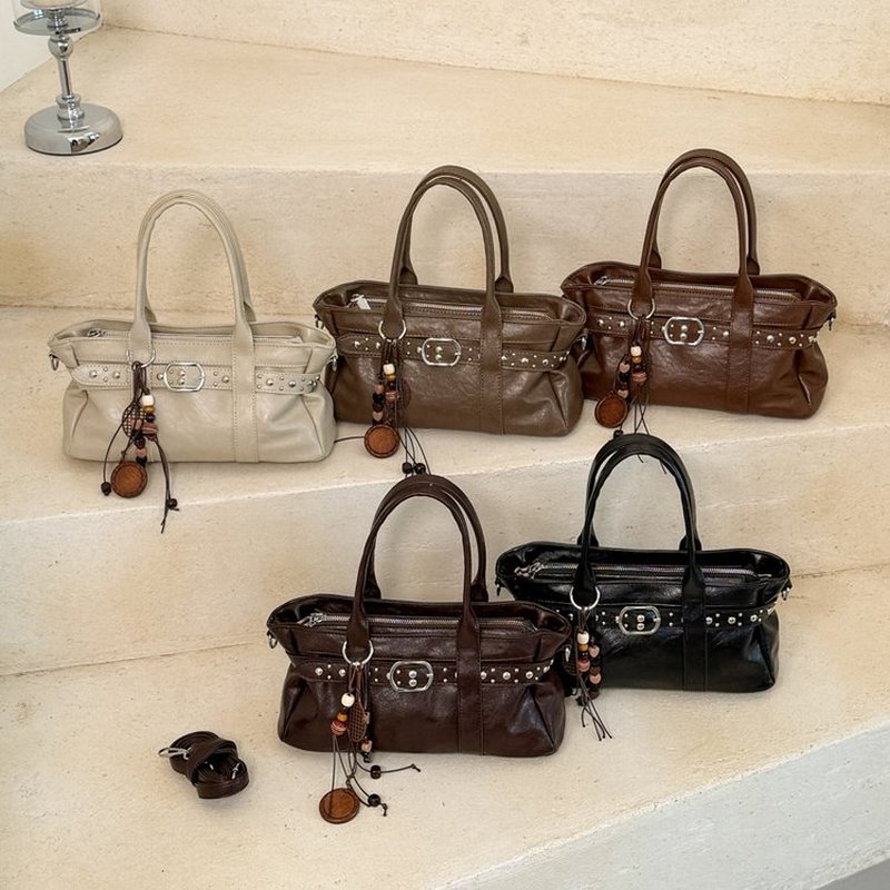 Женская коричневая сумка из ис – обзор и цена Leatherwork Rivets